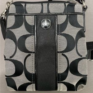 Coach cross body black purse w/ logo